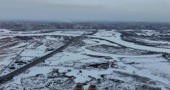 航拍黑龙江哈尔滨日出雪景视频