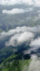  河源缺牙山云海中的风力发电机航拍天空空镜视频
