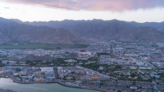 西藏拉萨市城市风景日落夜景延时视频