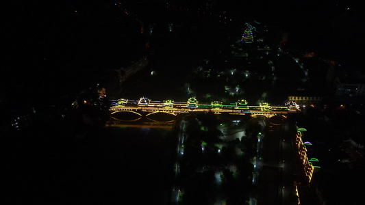 少数民族特色建筑鼓楼风雨桥夜景航拍视频