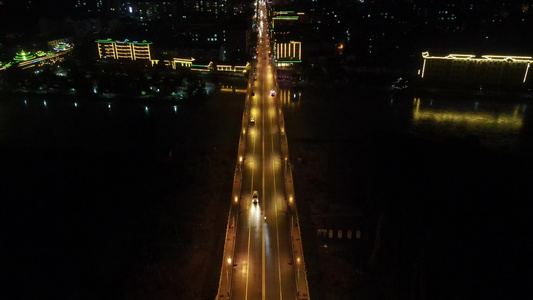 少数民族特色建筑鼓楼风雨桥夜景航拍视频