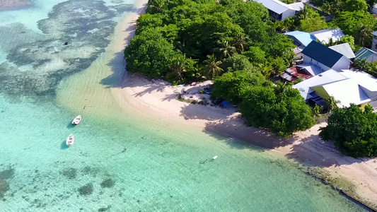 蓝色环礁湖旅行海浪附近有白色沙子背景的白沙背景视频