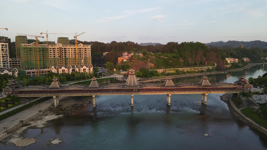 少数民族特色建筑鼓楼风雨桥夜景航拍视频