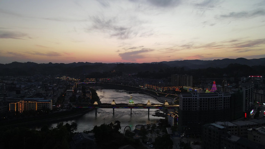 少数民族特色建筑鼓楼风雨桥夜景航拍视频