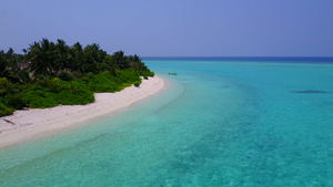 以清洁沙土背景的浅海为缓缓海湾海滩时间的抽象内容15秒视频