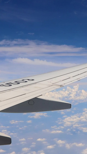 实拍云端飞机机翼国际民航日20秒视频