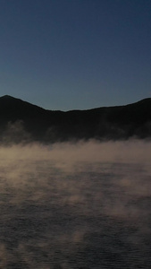 丽江泸沽湖清晨起雾逆光唯美拍摄视频