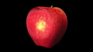 在黑色背景上旋转美味的红苹果12秒视频