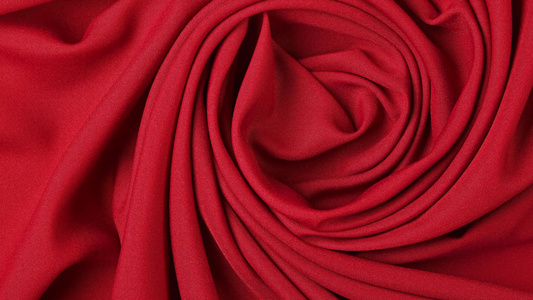 红色纺织品折叠括号旋转的背景背景视频