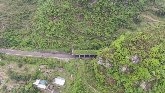 航拍大山中的火车轨道隧道交通视频