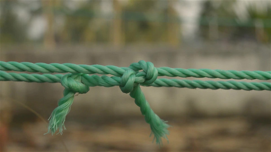 绳结结特写中间有两个打结的绳子与背景隔离信任力量安全视频