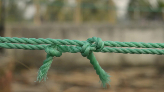 绳结结特写中间有两个打结的绳子与背景隔离信任力量安全视频