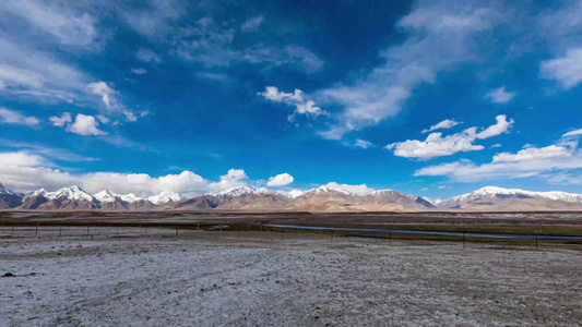 新疆木吉火山口雪山大范围风光4K延时视频