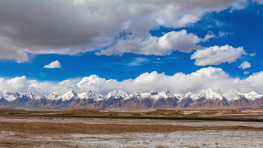 新疆木吉火山口雪山自然风光4K延时视频