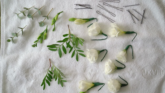 白玫瑰花用于发型新娘的婚礼风格美容师视频