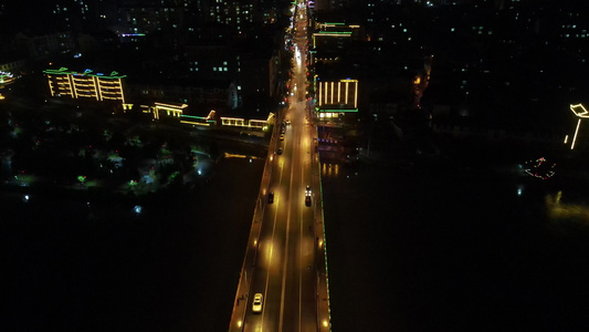 少数民族特色建筑鼓楼风雨桥夜景航拍视频