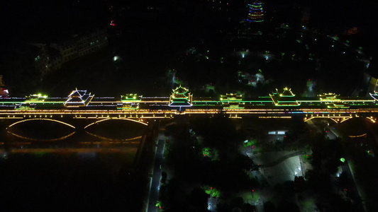 少数民族特色建筑鼓楼风雨桥夜景航拍视频