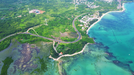 航拍海南环岛公路儋州路段海洋森林海岸与海岸线高视角航拍视频