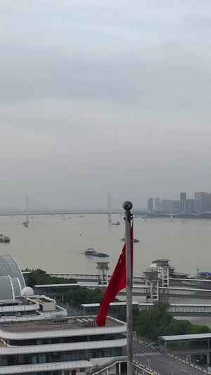 航拍环绕国旗五星红旗城市江景风光爱国教育素材K1285秒视频