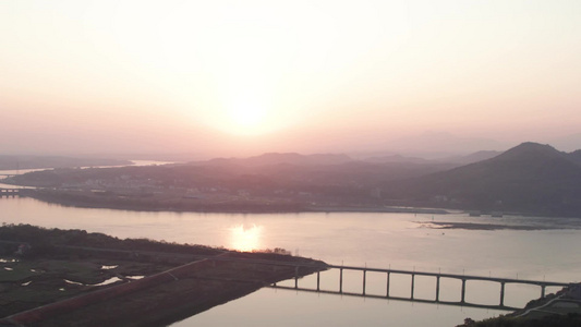 航拍河流山脉日落自然风光视频