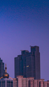 延时日出前后青岛五四广场城市高楼光线变化时间流逝视频