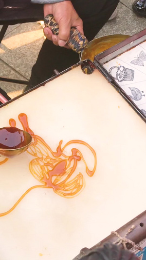 城市街头艺人传统手工转糖非物质文化遗产素材手工素材39秒视频