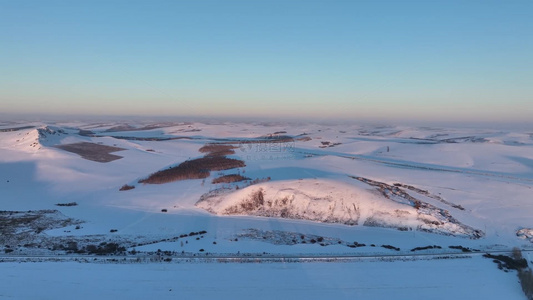 航拍大兴安岭雪景丘陵山地冬天风景视频