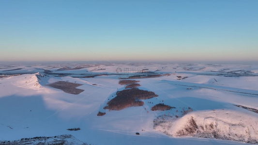 航拍大兴安岭雪景丘陵山地冬天风景视频