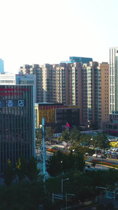 航拍河南郑州新区建筑绿地地标龙升广场视频