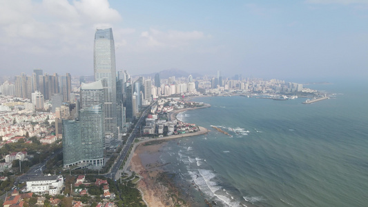 航拍山东青岛海岸线高楼商务建筑视频