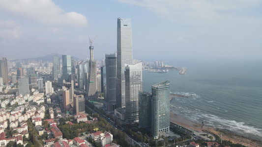 航拍山东青岛海岸线高楼商务建筑视频