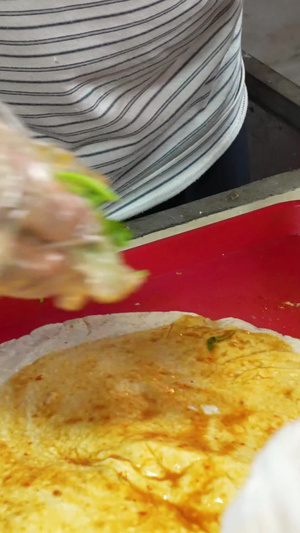 慢镜头升格拍摄素材城市街头中餐美食地方风味小吃卷饼小吃素材61秒视频