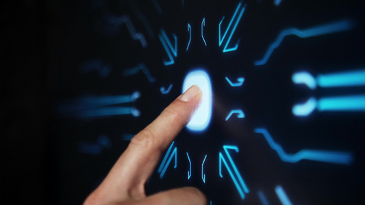 数字化概念：人的手指打开触摸屏按钮并激活未来人工智能。计算机技术垂直。软焦点视频