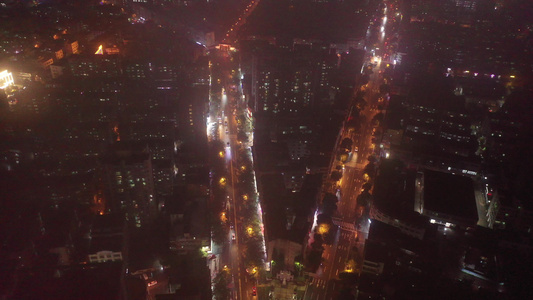 航拍海南省文昌市文城镇中心城区建筑群夜景视频