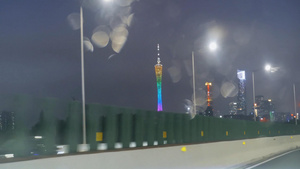 夜晚雨后车窗外灯火璀璨的广州塔14秒视频
