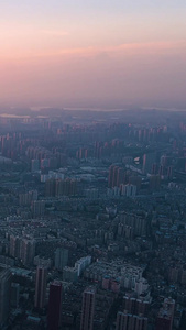 航拍日落时晚霞下的武汉城市建筑群视频