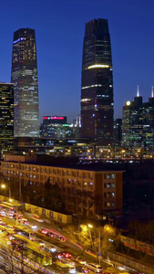 北京CBD窗外的城市公路日转夜延时视频