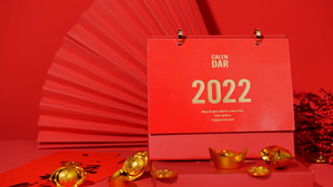 4K实拍2022新年红色日历喜庆氛围视频素材12秒视频