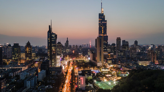 4K航拍南京地标紫峰大厦电视总台夜景延时摄影视频