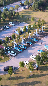 新能源绿色能源充电站小型停车充电站充电桩建筑航拍纯电动汽车视频