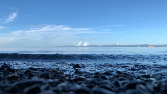 巴厘岛海边低角度海水冲击沙滩慢镜头升格视频视频