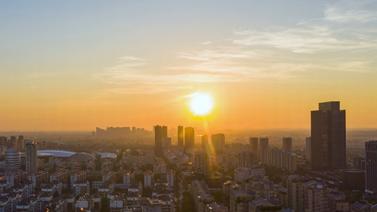 8K延时航拍城市日出太阳东升视频