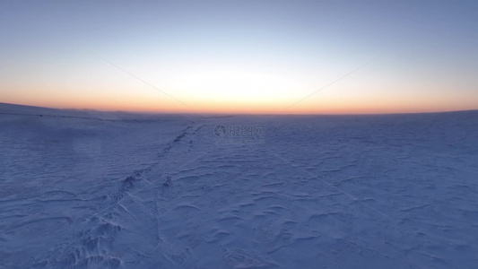 草原冬季雪景雪原暮色落日余晖视频