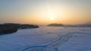 4k航拍黑龙江哈尔滨冬季冰雪覆盖松花江71秒视频