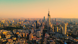 4K航拍黄昏夕阳下的南京城地标紫峰大厦53秒视频