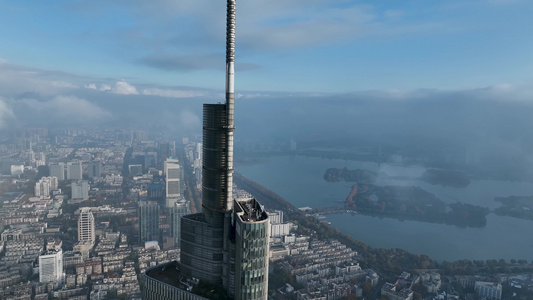 航拍云海下的南京地标紫峰大厦视频