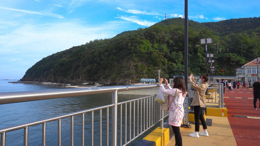 4K海边游客拍照风景空镜头[观光者]视频