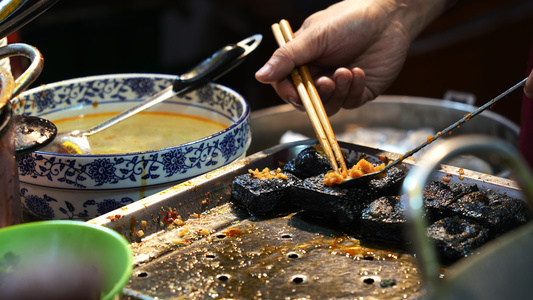 合集慢镜头升格拍摄湖南特色美食小吃油炸臭豆腐4k素材视频