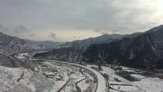 航拍雪后群山下雪后的大山视频