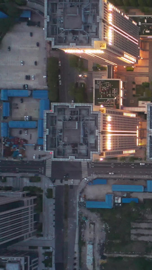 航拍俯拍森林城市商务金融写字楼夜景素材城市建设49秒视频
